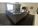 Inviting living room with a stone fireplace and a large comfortable couch at 401 Lawton Dr, Haw River, NC 27258