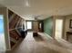 A spacious living room includes a wooden door, decorative wall and TV at 401 Lawton Dr, Haw River, NC 27258