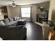 Welcoming living room featuring a fireplace and comfortable seating at 401 Lawton Dr, Haw River, NC 27258