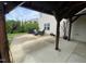 Covered patio with an outdoor dining set and a view of the backyard at 401 Lawton Dr, Haw River, NC 27258