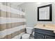 Cozy bathroom with stylish vanity, mirror and neutral-toned shower curtain at 405 Braxman Ln, Holly Springs, NC 27540