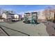 Community playground featuring climbing structures, picnic tables, and play area for hours of fun at 405 Braxman Ln, Holly Springs, NC 27540