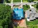 Aerial view of home under construction in neighborhood with green lawns at 405 Latimer Rd, Raleigh, NC 27609