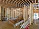 Interior view of home under construction, showing framing and beams at 405 Latimer Rd, Raleigh, NC 27609