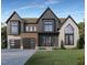 New construction with a modern design, featuring a two car garage and complementary colored construction materials at 405 Latimer Rd, Raleigh, NC 27609