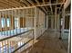 Unfinished living room view with walls, floors and exterior view through the windows at 405 Latimer Rd, Raleigh, NC 27609