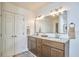 Bathroom with double vanity, granite countertop and bright lighting at 44 Lure Ct, Durham, NC 27713