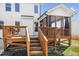 Staircase leads to backyard deck and screened-in porch at 4412 Beckel Rd, Willow Springs, NC 27592