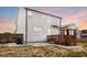 Exterior view of a home featuring a wooden deck and patio at 4412 Beckel Rd, Willow Springs, NC 27592