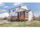 Exterior view of a home featuring a wooden deck and screened in porch at 4412 Beckel Rd, Willow Springs, NC 27592