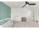 Bedroom with a ceiling fan and built-in shelving at 4412 Beckel Rd, Willow Springs, NC 27592