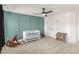 This is a bedroom with a crib, ceiling fan, and decor at 4412 Beckel Rd, Willow Springs, NC 27592