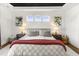 Bedroom with a large comfortable bed, unique decor, side tables and stylish lighting at 4412 Beckel Rd, Willow Springs, NC 27592