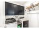 Modern laundry room featuring front load machines and custom cabinets at 4412 Beckel Rd, Willow Springs, NC 27592