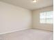 Neutral bedroom featuring a window at 50 Dover Ridge Ct, Chapel Hill, NC 27517