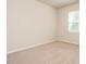 Cozy bedroom with neutral carpet and a bright window at 50 Dover Ridge Ct, Chapel Hill, NC 27517