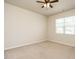 Bright and airy bedroom with neutral walls, carpet, and natural light from the window at 50 Dover Ridge Ct, Chapel Hill, NC 27517