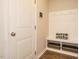 Charming entryway features a built-in bench, coat hooks, and storage baskets at 50 Dover Ridge Ct, Chapel Hill, NC 27517
