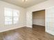 Office with hardwood floors, a large window, and French doors at 50 Dover Ridge Ct, Chapel Hill, NC 27517