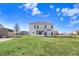Spacious backyard features a large lawn, shed, and screen-in porch, perfect for outdoor living and entertaining at 500 Wakefield Dr, Princeton, NC 27569