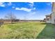 Spacious backyard with trampoline and views of surrounding landscape at 500 Wakefield Dr, Princeton, NC 27569