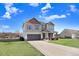 Beautiful two-story home with a two-car garage and a spacious driveway and well maintained lawn at 500 Wakefield Dr, Princeton, NC 27569