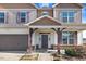 Inviting home featuring a covered porch with timber supports, and a two car garage on a well landscaped yard at 500 Wakefield Dr, Princeton, NC 27569