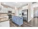 Bright kitchen with white cabinets, stainless steel appliances, granite countertops, and center island at 500 Wakefield Dr, Princeton, NC 27569