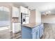 Bright kitchen with white cabinets, stainless steel appliances, granite countertops, and center island at 500 Wakefield Dr, Princeton, NC 27569