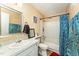 Full bathroom with a single sink vanity and shower and tub combo at 5816 Pointer Dr # 102, Raleigh, NC 27609