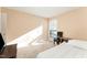 Bedroom featuring a large window providing lots of natural light at 5816 Pointer Dr # 102, Raleigh, NC 27609