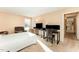 Primary bedroom with large window and office area at 5816 Pointer Dr # 102, Raleigh, NC 27609