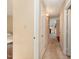 Hallway with neutral walls, carpeting, and doorways leading to other rooms in the house at 5816 Pointer Dr # 102, Raleigh, NC 27609