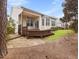 Relax on the back deck and enjoy the green space around the property at 5910 Lacebark Ln, Durham, NC 27713