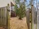 Back yard featuring a well-maintained wooden fence and a wooden deck at 5910 Lacebark Ln, Durham, NC 27713