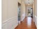 Inviting entryway featuring hardwood floors, decorative molding, and natural light at 5910 Lacebark Ln, Durham, NC 27713