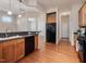 Charming kitchen with stainless appliances, wood cabinets, and an open layout at 5910 Lacebark Ln, Durham, NC 27713