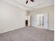 Well-lit main bedroom featuring access to the bathroom and kitchen area at 5910 Lacebark Ln, Durham, NC 27713