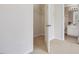 Walk-in closet offers plenty of storage space with built in wire shelving at 5910 Lacebark Ln, Durham, NC 27713