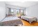 Inviting bedroom with two beds, providing ample space for guests or Gathering members at 601 Lee St, Durham, NC 27701