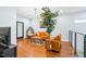 Cozy living space with hardwood floors, stylish lighting, and a comfortable seating arrangement at 601 Lee St, Durham, NC 27701