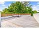 This spacious rooftop deck offers ample room for outdoor seating and enjoying the surrounding green scenery at 601 Lee St, Durham, NC 27701