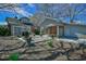 The backyard features a brick home, patio with outdoor kitchen, and expansive yard space at 7055 Old 421 Rd, Liberty, NC 27298