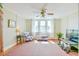 Bright and airy bonus room with natural light, offering a versatile space for relaxation and recreation at 7055 Old 421 Rd, Liberty, NC 27298
