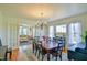 Charming dining room with chandelier, with access to a comfortable living room at 7055 Old 421 Rd, Liberty, NC 27298