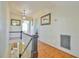 Upper hallway with views to lower level and nearby rooms at 7055 Old 421 Rd, Liberty, NC 27298