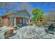 A large patio area with room to entertain. An outdoor kitchen area can also be seen in the background at 7055 Old 421 Rd, Liberty, NC 27298