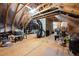 Spacious unfinished attic; features wooden beams and ample storage space at 706 Tibumoll Ln, Fuquay Varina, NC 27526