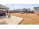 Large backyard featuring a concrete patio, trampoline and privacy fence at 706 Tibumoll Ln, Fuquay Varina, NC 27526