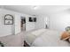 Inviting bedroom featuring a cozy bed and TV, with open doorways to other areas, enhancing the space and flow at 706 Tibumoll Ln, Fuquay Varina, NC 27526